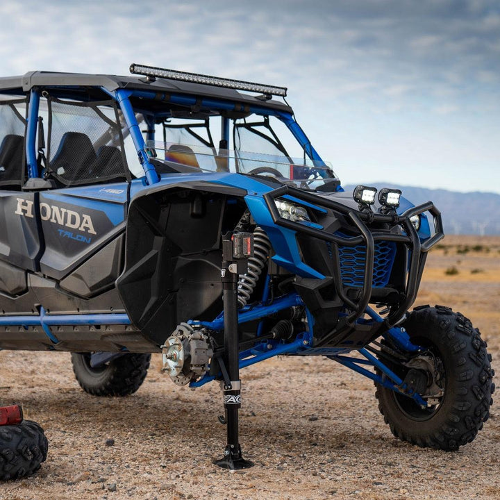 AGM Electric Jack lifting the front of a Honda Talon